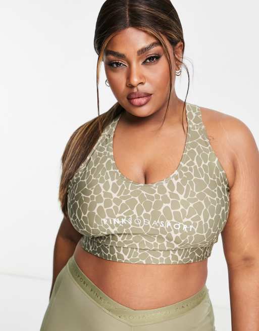 Pink Soda Plus light support sports bra in olive animal print ASOS