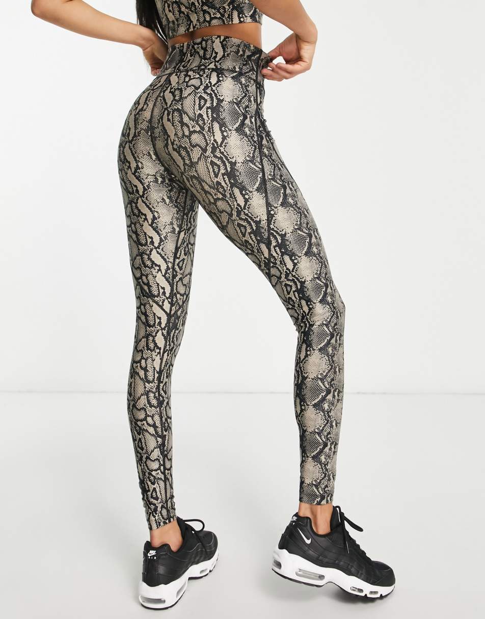 Pink Soda Sport Adder polyester blend legging with snake print in