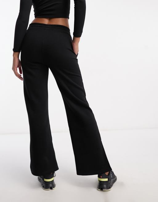 Pink Soda Sport Wilacre flared joggers in black ASOS