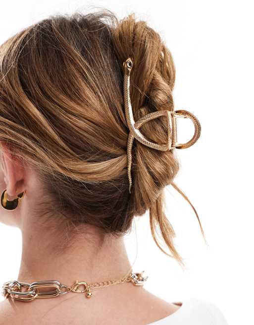 Pinza para el cabello dorada con diseño de serpiente de ASOS DESIGN, 2 de 4