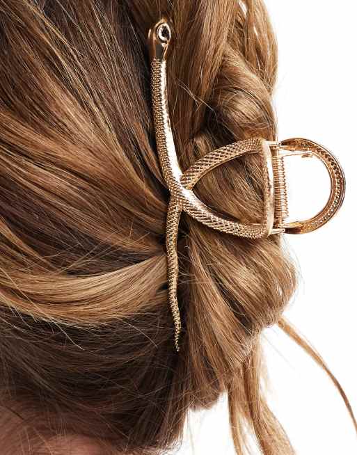 Pinza para el cabello dorada con diseño de serpiente de ASOS DESIGN, 3 de 4