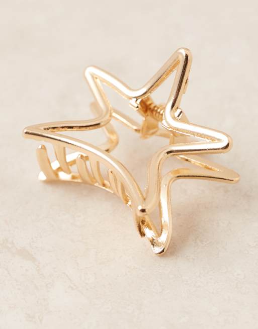 Pinza para el cabello dorada en forma de estrella de metal de DesignB London, 2 de 3