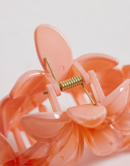 Pinza para el cabello naranja con diseño de tres flores de South Beach, 2 de 3