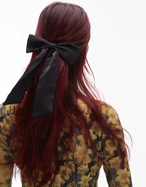 Pinza para el cabello negra con lazo grande de & Other Stories