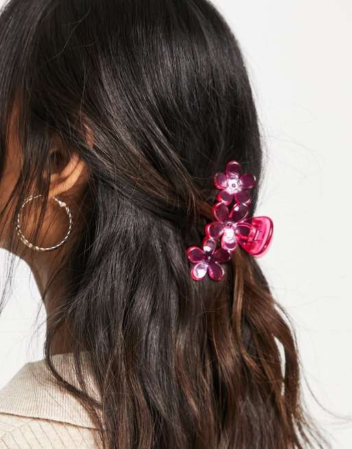 Pinza para el pelo color rosa intenso con diseño de flor de Monki