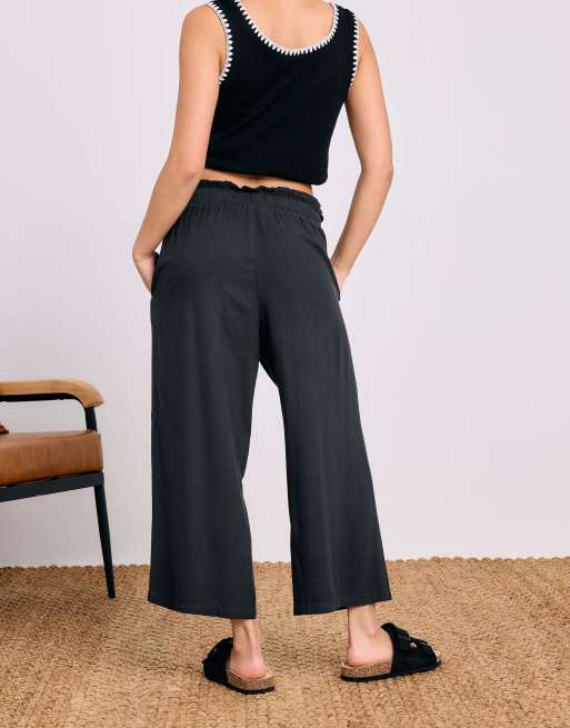 PixieGirl Petite acid wash cropped trousers in black, 3 of 4