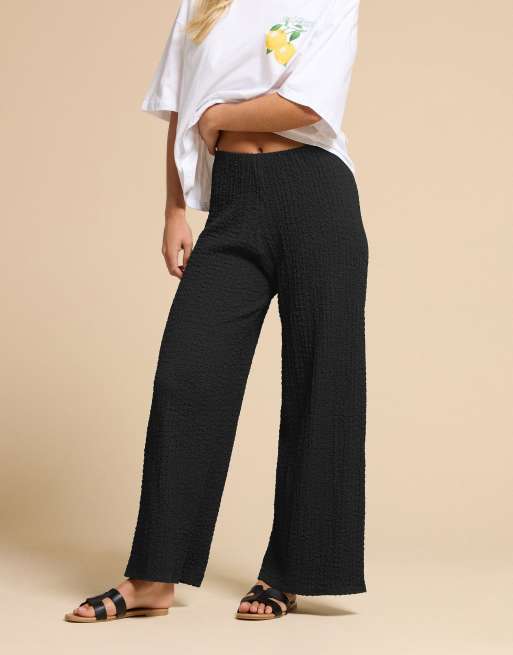 PixieGirl Petite bubble textured wide leg trousers in black, 2 of 5