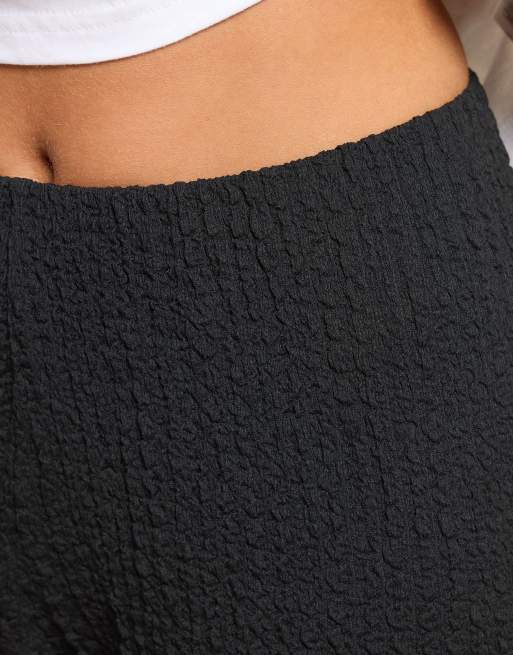 PixieGirl Petite bubble textured wide leg trousers in black, 5 of 5