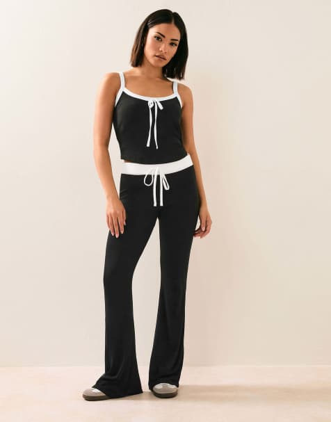 PixieGirl Petite flared trousers in black - view 1