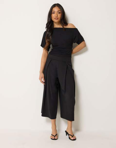 PixieGirl Petite pleated cropped wide leg trousers in black - view 1