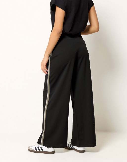 PixieGirl Petite side stripe wide leg trousers in black, 3 of 4