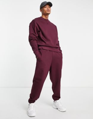 фото Плотные джоггеры бордового цвета в стиле "oversized" asos design-красный