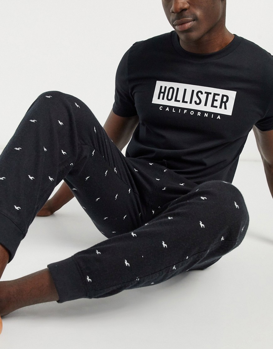 фото Подарочный набор для дома из футболки и джоггеров черного цвета со сплошным принтом логотипа hollister-черный