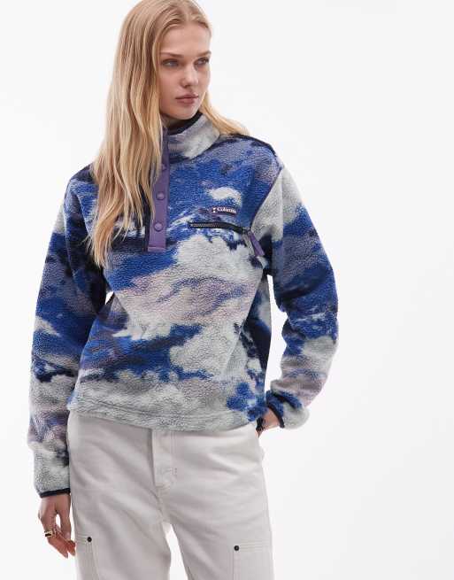 Polar corto azul multicolor con diseño estampado y media tapeta de botones de presión Helvetia II de Columbia