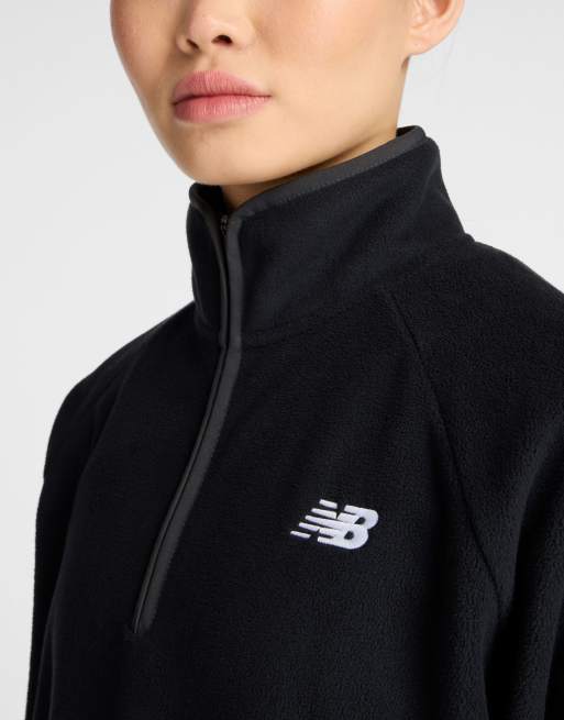 Polar negro con media cremallera Sport de New Balance, 4 de 4
