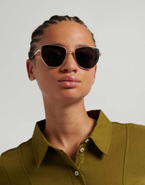 Polaroid – Sonnenbrillen – Eckige Sonnenbrille in Goldoptik mit grauen, polarisierten Gläsern - view 1
