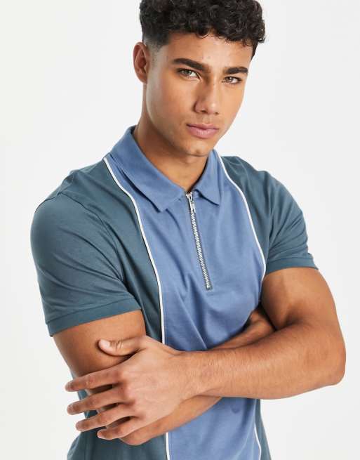 Polo azul con paneles en contraste de ASOS DESIGN 