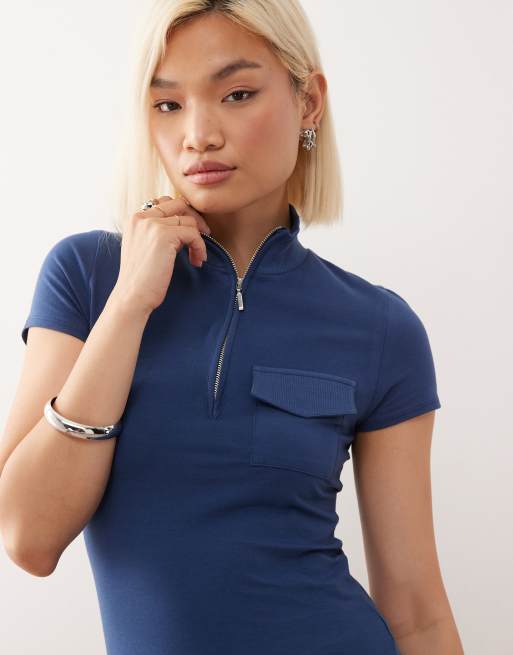 Polo azul denim ajustado con diseño vintage y acabado lavado de COLLUSION