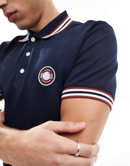 Polo azul marino con detalle de rayas Live Forever Engineered de Pretty Green, 2 de 4