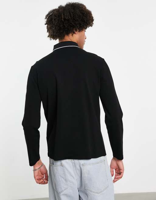 Polo azul marino con logo de texto y cremallera en el cuello de Armani Exchange, 3 de 4