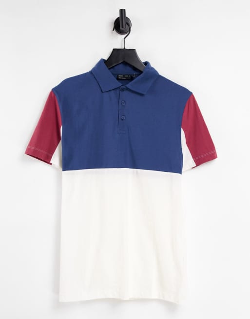 Polo azul marino y rojo color block de ASOS DESIGN 