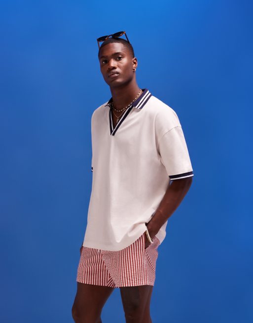 Polo beis extragrande con cuello de solapas azul de ASOS DESIGN