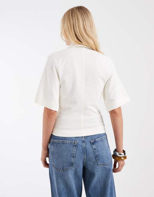 Polo blanco con cremallera de & Other Stories, 2 de 4