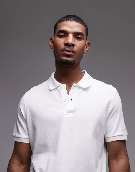 Polo blanco con cuello de solapas de punto liso de Mango