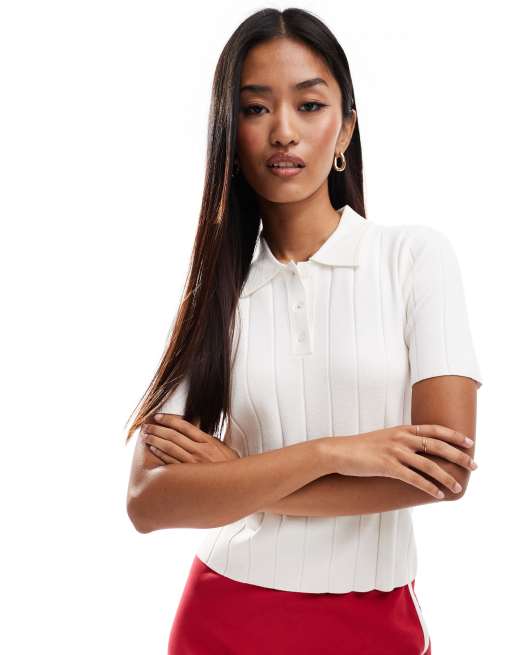 Polo blanco con detalles acanalados de Mango