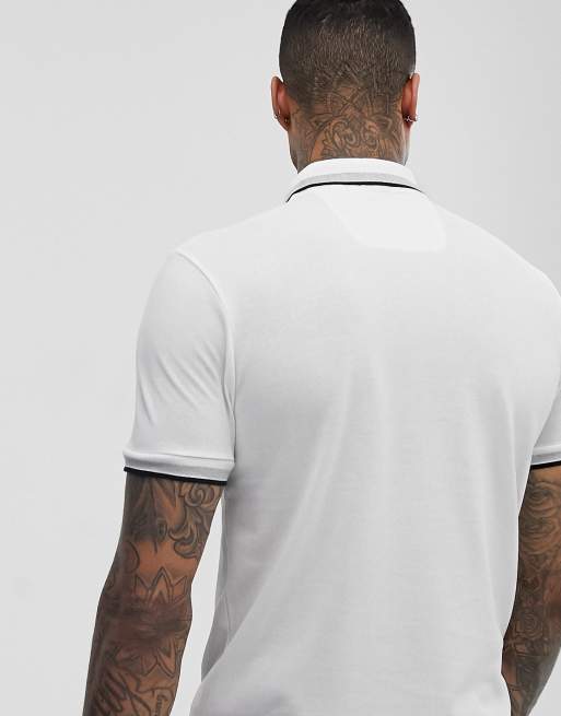 Polo blanco con ribetes Paddy de BOSS Athleisure, 2 de 4