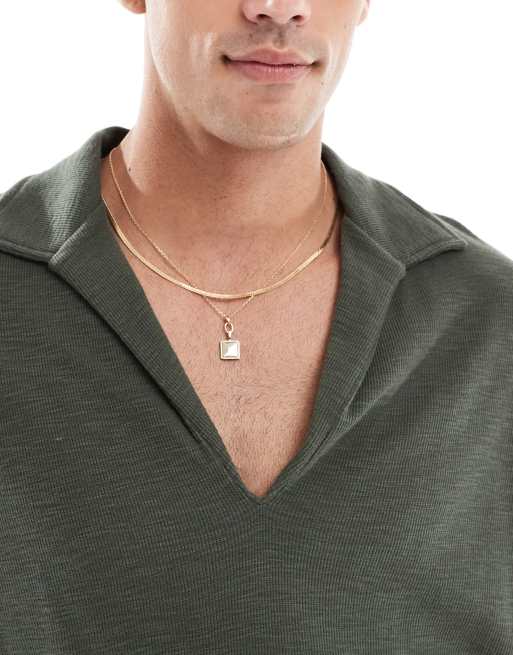 Polo caqui extragrande con cuello de pico pronunciado de tejido texturizado de ASOS DESIGN, 2 de 4