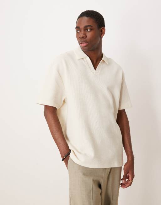 Polo color crema holgado de punto gofrado de ASOS DESIGN