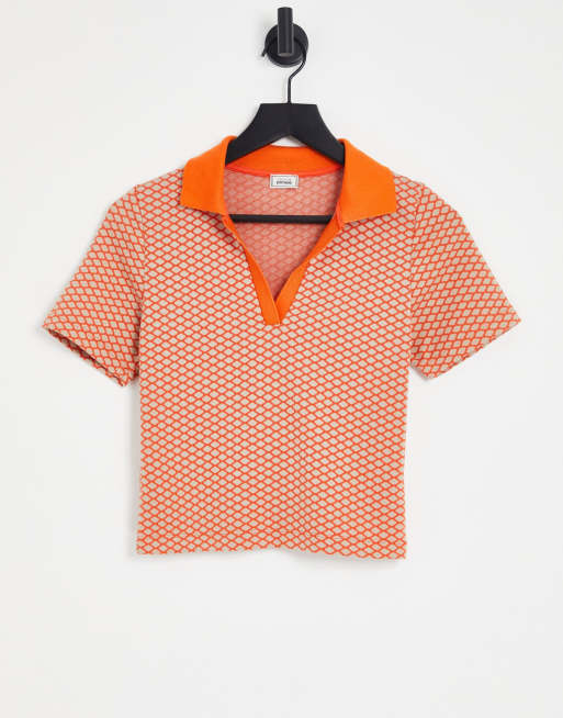 Polo corto naranja de punto de jacquard de Pimkie (parte de un conjunto)