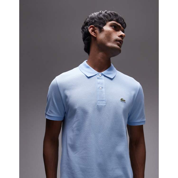 Polo de corte slim de piqué azul claro con logo de Lacoste ASOS