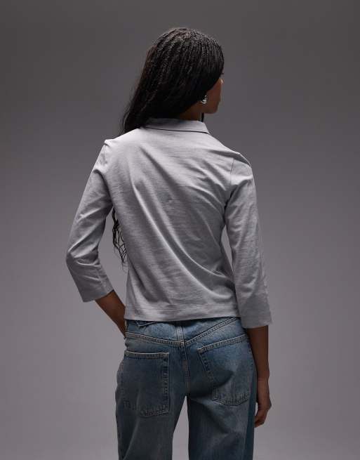 Polo gris con mangas 3/4 y cremallera al cuello de punto acanalado de ARKET, 3 de 4