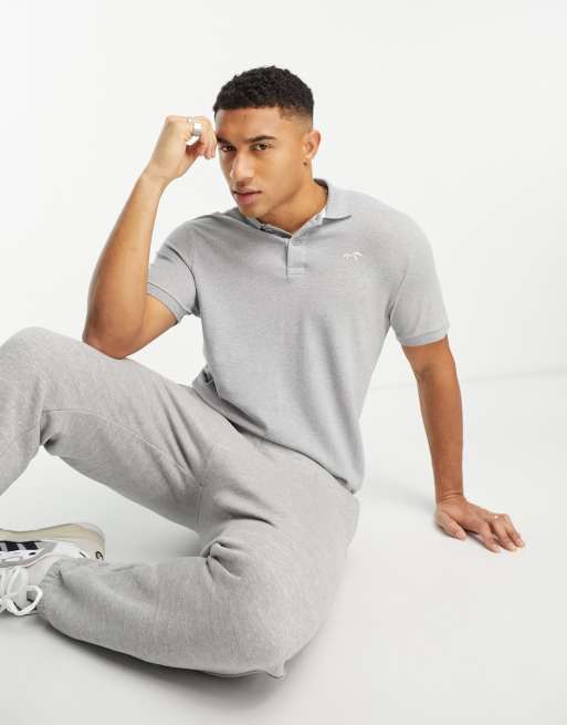 Polo gris medio con logo de icono de piqué de Hollister