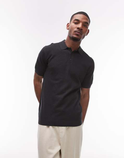 Polo negro con cuello de solapas de punto de Mango - view 1