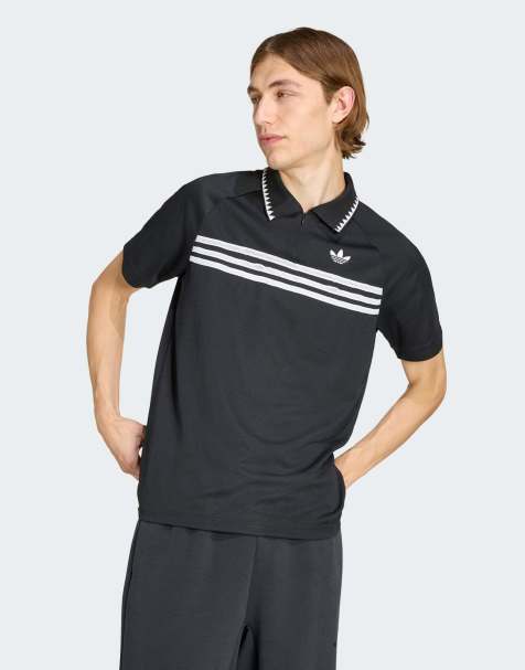 Polo negro con detalle de rayas en el pecho de corte slim de adidas Originals - view 1