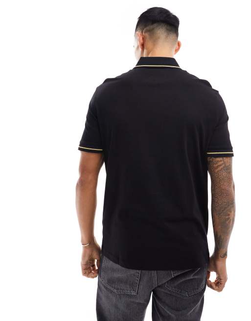 Polo negro con ribetes y logo dorados de piqué de Armani Exchange, 4 de 4