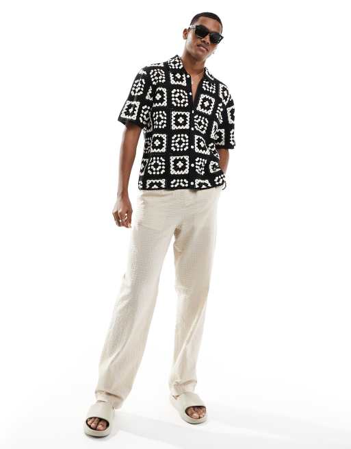 Polo negro de manga corta con patrón de cuadrados de croché de Abercrombie & Fitch
