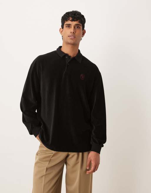 Polo negro extragrande de manga larga con pequeño detalle bordado en el pecho de velour acanalado grueso de ASOS DESIGN