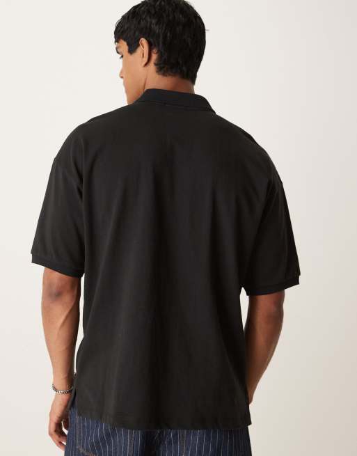 Polo negro holgado con logo de texto e icono de punto liso de Polo Ralph Lauren, 4 de 4