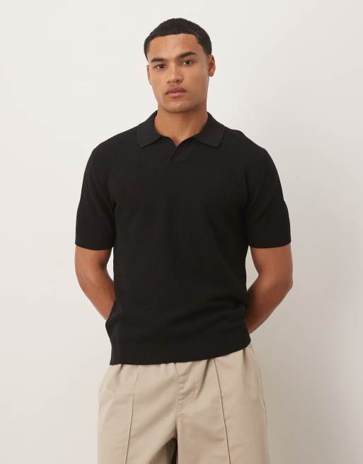 Polo negro holgado de punto fino de Mango