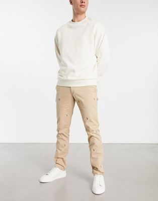 Polo Ralph Lauren all over pony logo slim fit chinos in beige