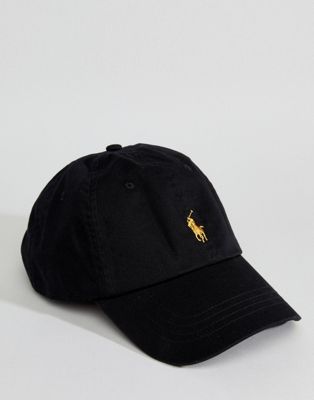 black and yellow polo hat