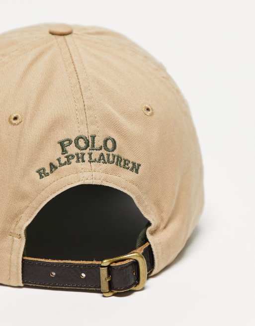 Anja Balovneva wearing Polo Ralph Lauren beige cap, Zara brown