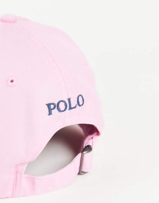 Pink and store white polo hat