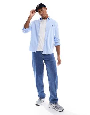 Polo Ralph Lauren icon logo button down pique shirt in light blue - ASOS Price Checker