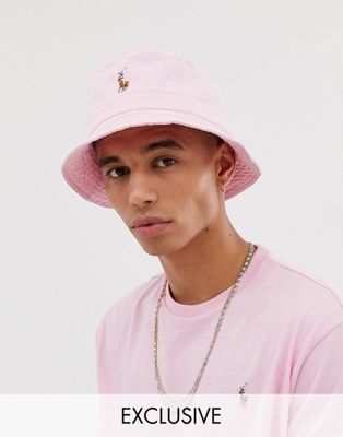 Polo Ralph Lauren Exclusive to Asos multi player logo bucket hat in light  pink | ASOS