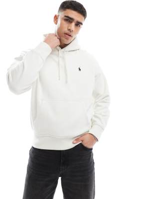 Polo Ralph Lauren - Felpa taglio comodo in tessuto pesante color crema con cappuccio e scritta del logo stampata sul retro